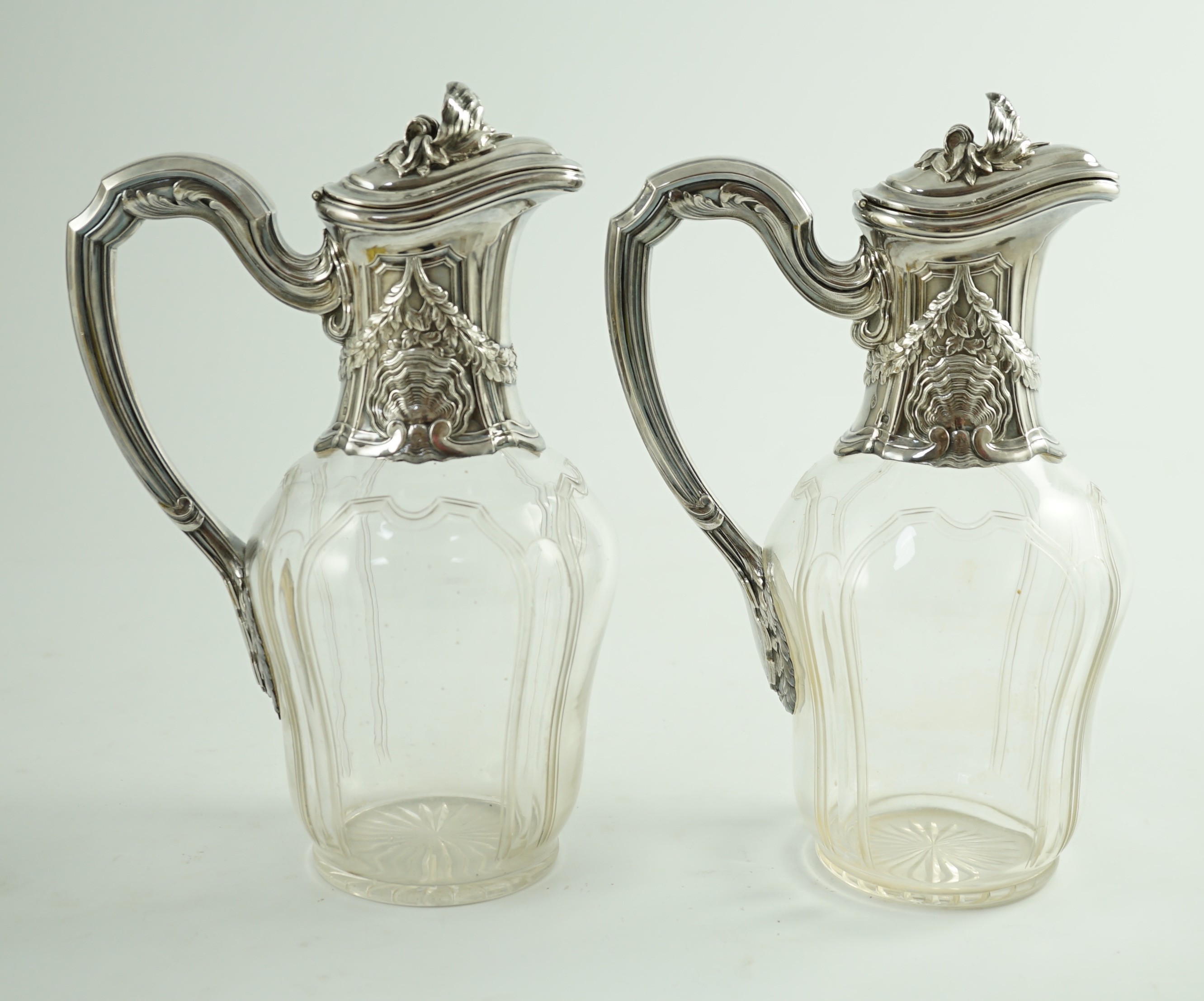 A pair of early 20th century French 950 standard silver mounted glass claret jugs, by Risler & Carre